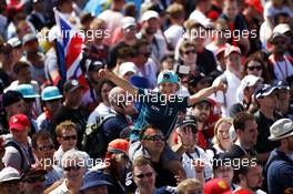 Fans invade the circuit at the podium. 05.07.2015. Formula 1 World Championship, Rd 9, British Grand Prix, Silverstone, England, Race Day.