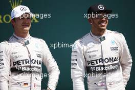 The podium (L to R): second placed Nico Rosberg (GER) Mercedes AMG F1 with race winner Lewis Hamilton (GBR) Mercedes AMG F1. 05.07.2015. Formula 1 World Championship, Rd 9, British Grand Prix, Silverstone, England, Race Day.
