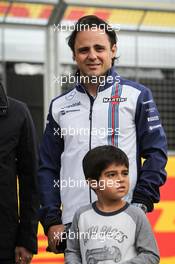Felipe Massa (BRA) Williams with his son Felipinho Massa (BRA). 02.07.2015. Formula 1 World Championship, Rd 9, British Grand Prix, Silverstone, England, Preparation Day.