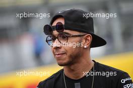 Lewis Hamilton (GBR) Mercedes AMG F1 - new sunglasses. 02.07.2015. Formula 1 World Championship, Rd 9, British Grand Prix, Silverstone, England, Preparation Day.