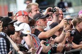 Fans in the pit lane. 02.07.2015. Formula 1 World Championship, Rd 9, British Grand Prix, Silverstone, England, Preparation Day.