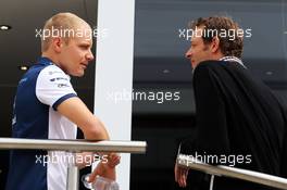 (L to R): Valtteri Bottas (FIN) Williams with Alex Wurz (AUT) Williams Driver Mentor / GPDA Chairman. 02.07.2015. Formula 1 World Championship, Rd 9, British Grand Prix, Silverstone, England, Preparation Day.
