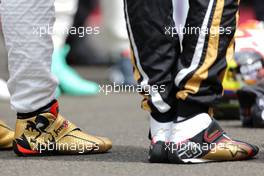 Drivers during the minute of silence for Jules Bianchi, Jenson Button (GBR), McLaren Honda and Pastor Maldonado (VEN), Lotus F1 Team  26.07.2015. Formula 1 World Championship, Rd 10, Hungarian Grand Prix, Budapest, Hungary, Race Day.