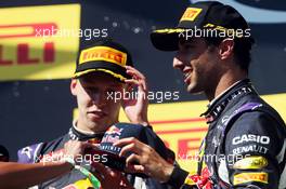 (L to R): Daniil Kvyat (RUS) Red Bull Racing with Daniel Ricciardo (AUS) Red Bull Racing on the podium. 26.07.2015. Formula 1 World Championship, Rd 10, Hungarian Grand Prix, Budapest, Hungary, Race Day.