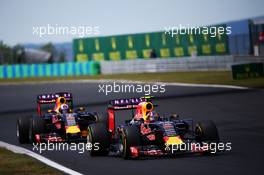 Daniil Kvyat (RUS) Red Bull Racing RB11 leads team mate Daniel Ricciardo (AUS) Red Bull Racing RB11. 26.07.2015. Formula 1 World Championship, Rd 10, Hungarian Grand Prix, Budapest, Hungary, Race Day.