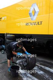 Mercedes AMG F1 mechanic washes Pirelli tyres. 25.07.2015. Formula 1 World Championship, Rd 10, Hungarian Grand Prix, Budapest, Hungary, Qualifying Day.