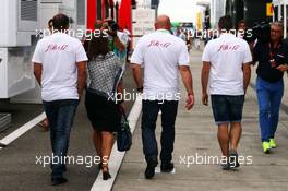 The family of Jules Bianchi in the paddock (R to L): Tom, Philippe and Christine Bianchi - brother, father and mother. 26.07.2015. Formula 1 World Championship, Rd 10, Hungarian Grand Prix, Budapest, Hungary, Race Day.