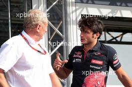 (L to R): Dr Helmut Marko (AUT) Red Bull Motorsport Consultant with Carlos Sainz Jr (ESP) Scuderia Toro Rosso STR10. 04.09.2015. Formula 1 World Championship, Rd 12, Italian Grand Prix, Monza, Italy, Practice Day.
