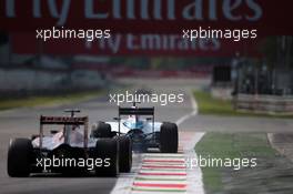 Valtteri Bottas (FIN) Williams FW37 leads Max Verstappen (NLD) Scuderia Toro Rosso STR10. 04.09.2015. Formula 1 World Championship, Rd 12, Italian Grand Prix, Monza, Italy, Practice Day.