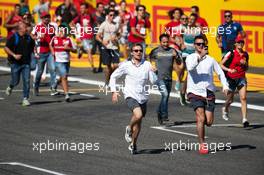 Fans invade the circuit and run to to the podium. 06.09.2015. Formula 1 World Championship, Rd 12, Italian Grand Prix, Monza, Italy, Race Day.
