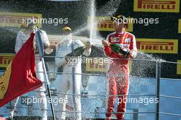 (L to R): Race winner Lewis Hamilton (GBR) Mercedes AMG F1, third placed Felipe Massa (BRA) Williams and second placed Sebastian Vettel (GER) Ferrari celebrate on the podium. 06.09.2015. Formula 1 World Championship, Rd 12, Italian Grand Prix, Monza, Italy, Race Day.