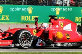 Sebastian Vettel (GER) Ferrari SF15-T celebrates his second position at the end of the race. 06.09.2015. Formula 1 World Championship, Rd 12, Italian Grand Prix, Monza, Italy, Race Day.
