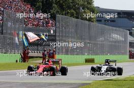 (L to R): Kimi Raikkonen (FIN) Ferrari SF15-T and Nico Hulkenberg (GER) Sahara Force India F1 VJM08 battle for position. 06.09.2015. Formula 1 World Championship, Rd 12, Italian Grand Prix, Monza, Italy, Race Day.