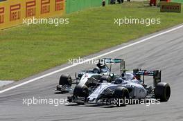 Valtteri Bottas (FIN) Williams FW37 and Nico Rosberg (GER) Mercedes AMG F1 W06 battle for position. 06.09.2015. Formula 1 World Championship, Rd 12, Italian Grand Prix, Monza, Italy, Race Day.