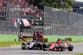 (L to R): Sergio Perez (MEX) Sahara Force India F1 VJM08 and Kimi Raikkonen (FIN) Ferrari SF15-T battle for position. 06.09.2015. Formula 1 World Championship, Rd 12, Italian Grand Prix, Monza, Italy, Race Day.