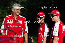 (L to R): Maurizio Arrivabene (ITA) Ferrari Team Principal; Sebastian Vettel (GER) Ferrari and team mate Kimi Raikkonen (FIN) Ferrari on the Monza banking at a Shell photoshoot. 05.09.2015. Formula 1 World Championship, Rd 12, Italian Grand Prix, Monza, Italy, Qualifying Day.