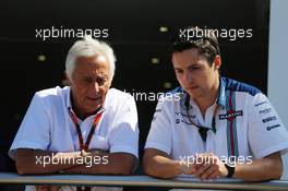 (L to R): Bob Constanduros (GBR) Journalist and Circuit Commentator with his son Max Constanduros (GBR) Williams Press Officer. 06.09.2015. Formula 1 World Championship, Rd 12, Italian Grand Prix, Monza, Italy, Race Day.