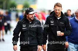 (L to R): Fernando Alonso (ESP) McLaren with team mate Jenson Button (GBR) McLaren. 25.09.2015. Formula 1 World Championship, Rd 14, Japanese Grand Prix, Suzuka, Japan, Practice Day.