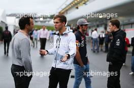 Pierre Gasly (FRA) Red Bull Racing Test Driver (Centre)  25.09.2015. Formula 1 World Championship, Rd 14, Japanese Grand Prix, Suzuka, Japan, Practice Day.