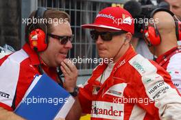 Kimi Raikkonen (FIN) Ferrari with Dave Greenwood (GBR) Ferrari Race Engineer on the grid. 27.09.2015. Formula 1 World Championship, Rd 14, Japanese Grand Prix, Suzuka, Japan, Race Day.