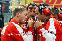 Sebastian Vettel (GER) Ferrari on the grid. 27.09.2015. Formula 1 World Championship, Rd 14, Japanese Grand Prix, Suzuka, Japan, Race Day.