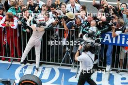 (L to R): Race winner Lewis Hamilton (GBR) Mercedes AMG F1 celebrates in parc ferme with second placed team mate Nico Rosberg (GER) Mercedes AMG F1. 27.09.2015. Formula 1 World Championship, Rd 14, Japanese Grand Prix, Suzuka, Japan, Race Day.