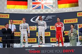 The podium (L to R): Nico Rosberg (GER) Mercedes AMG F1, second; Lewis Hamilton (GBR) Mercedes AMG F1, race winner; Sebastian Vettel (GER) Ferrari, third. 27.09.2015. Formula 1 World Championship, Rd 14, Japanese Grand Prix, Suzuka, Japan, Race Day.