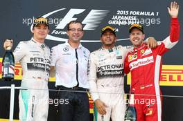 1st place Lewis Hamilton (GBR) Mercedes AMG F1 W06, 2nd place Nico Rosberg (GER) Mercedes AMG F1 and 3rd place Sebastian Vettel (GER) Ferrari SF15-T. 27.09.2015. Formula 1 World Championship, Rd 14, Japanese Grand Prix, Suzuka, Japan, Race Day.