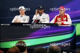 The post race FIA Press Conference (L to R): Nico Rosberg (GER) Mercedes AMG F1, second; Lewis Hamilton (GBR) Mercedes AMG F1, race winner; Sebastian Vettel (GER) Ferrari, third. 27.09.2015. Formula 1 World Championship, Rd 14, Japanese Grand Prix, Suzuka, Japan, Race Day.