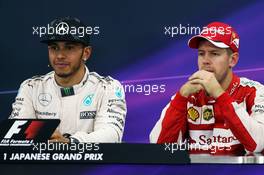 (L to R): Lewis Hamilton (GBR) Mercedes AMG F1 and Sebastian Vettel (GER) Ferrari in the FIA Press Conference. 27.09.2015. Formula 1 World Championship, Rd 14, Japanese Grand Prix, Suzuka, Japan, Race Day.