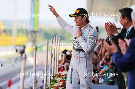 Nico Rosberg (GER) Mercedes AMG F1 celebrates his second position on the podium. 27.09.2015. Formula 1 World Championship, Rd 14, Japanese Grand Prix, Suzuka, Japan, Race Day.