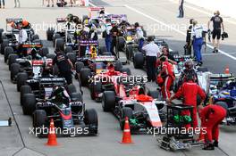 The cars in parc ferme at the end of the race. 27.09.2015. Formula 1 World Championship, Rd 14, Japanese Grand Prix, Suzuka, Japan, Race Day.