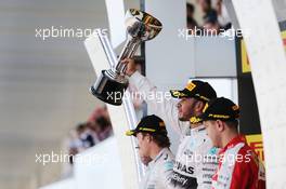 Race winner Lewis Hamilton (GBR) Mercedes AMG F1 celebrates on the podium. 27.09.2015. Formula 1 World Championship, Rd 14, Japanese Grand Prix, Suzuka, Japan, Race Day.