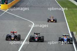(L to R): Max Verstappen (NLD) Scuderia Toro Rosso STR10, Jenson Button (GBR) McLaren MP4-30 and Felipe Nasr (BRA) Sauber C34 battle for position. 27.09.2015. Formula 1 World Championship, Rd 14, Japanese Grand Prix, Suzuka, Japan, Race Day.
