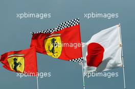 Ferrari flags and the Japanese flag. 26.09.2015. Formula 1 World Championship, Rd 14, Japanese Grand Prix, Suzuka, Japan, Qualifying Day.
