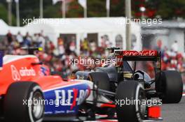 Pastor Maldonado (VEN) Lotus F1 E23 leads Alexander Rossi (USA) Manor Marussia F1 Team. 26.09.2015. Formula 1 World Championship, Rd 14, Japanese Grand Prix, Suzuka, Japan, Qualifying Day.