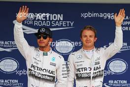 (L to R): second placed Lewis Hamilton (GBR) Mercedes AMG F1 with team mate and pole sitter Nico Rosberg (GER) Mercedes AMG F1. 26.09.2015. Formula 1 World Championship, Rd 14, Japanese Grand Prix, Suzuka, Japan, Qualifying Day.