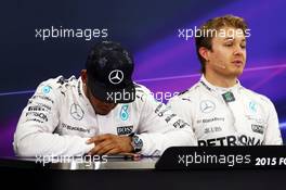 (L to R): Lewis Hamilton (GBR) Mercedes AMG F1 with Nico Rosberg (GER) Mercedes AMG F1 in the post qualifying FIA Press Conference. 26.09.2015. Formula 1 World Championship, Rd 14, Japanese Grand Prix, Suzuka, Japan, Qualifying Day.
