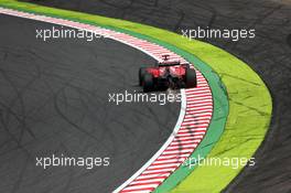 Sebastian Vettel (GER) Ferrari SF15-T sends sparks flying. 26.09.2015. Formula 1 World Championship, Rd 14, Japanese Grand Prix, Suzuka, Japan, Qualifying Day.