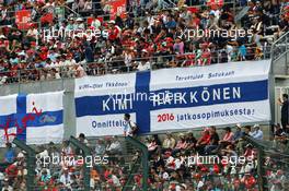 Fans in the grandstand and banners for Kimi Raikkonen (FIN) Ferrari. 26.09.2015. Formula 1 World Championship, Rd 14, Japanese Grand Prix, Suzuka, Japan, Qualifying Day.