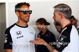 Jenson Button (GBR) McLaren with Steve Cooper (GBR) McLaren Press Officer. 27.09.2015. Formula 1 World Championship, Rd 14, Japanese Grand Prix, Suzuka, Japan, Race Day.