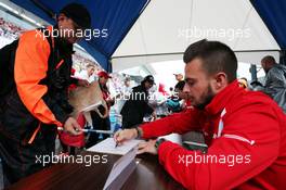 Will Stevens (GBR) Manor Marussia F1 Team signs autographs for the fans. 24.09.2015. Formula 1 World Championship, Rd 14, Japanese Grand Prix, Suzuka, Japan, Preparation Day.