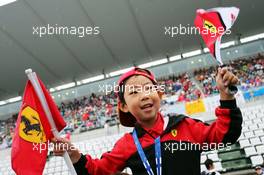 A young Ferrari fan. 24.09.2015. Formula 1 World Championship, Rd 14, Japanese Grand Prix, Suzuka, Japan, Preparation Day.