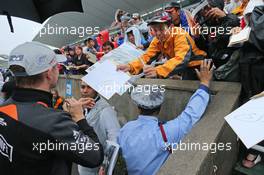 Nico Hulkenberg (GER) Sahara Force India F1 signs autographs for the fans. 24.09.2015. Formula 1 World Championship, Rd 14, Japanese Grand Prix, Suzuka, Japan, Preparation Day.