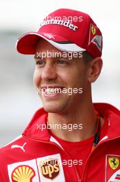 Sebastian Vettel (GER) Ferrari. 24.09.2015. Formula 1 World Championship, Rd 14, Japanese Grand Prix, Suzuka, Japan, Preparation Day.