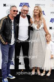 (L to R): Eddie Irvine (GBR) with Liam Cunningham (IRE) Actor and Sonia Irvine (GBR) at the Amber Lounge Fashion Show. 22.05.2015. Formula 1 World Championship, Rd 6, Monaco Grand Prix, Monte Carlo, Monaco, Friday.
