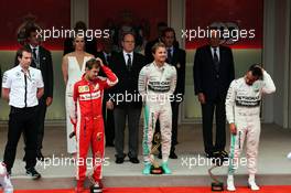 The podium (L to R): Sebastian Vettel (GER) Ferrari, second; Nico Rosberg (GER) Mercedes AMG F1, race winner; Lewis Hamilton (GBR) Mercedes AMG F1, third. 24.05.2015. Formula 1 World Championship, Rd 6, Monaco Grand Prix, Monte Carlo, Monaco, Race Day.