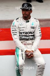 Third palced Lewis Hamilton (GBR) Mercedes AMG F1 on the podium. 24.05.2015. Formula 1 World Championship, Rd 6, Monaco Grand Prix, Monte Carlo, Monaco, Race Day.