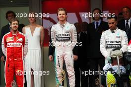 The podium (L to R): Sebastian Vettel (GER) Ferrari, second; Nico Rosberg (GER) Mercedes AMG F1, race winner; Lewis Hamilton (GBR) Mercedes AMG F1, third. 24.05.2015. Formula 1 World Championship, Rd 6, Monaco Grand Prix, Monte Carlo, Monaco, Race Day.