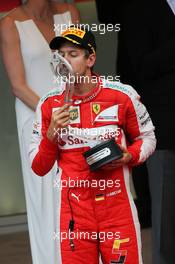 Sebastian Vettel (GER) Ferrari celebrates his second position on the podium. 24.05.2015. Formula 1 World Championship, Rd 6, Monaco Grand Prix, Monte Carlo, Monaco, Race Day.